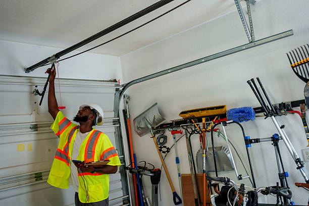 Professional Garage Door Panel Replacement technician working in De Witt, NY